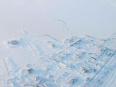 雪におおわれた町のようす／撮影・NASA ICE http://goo.gl/HXhi9a